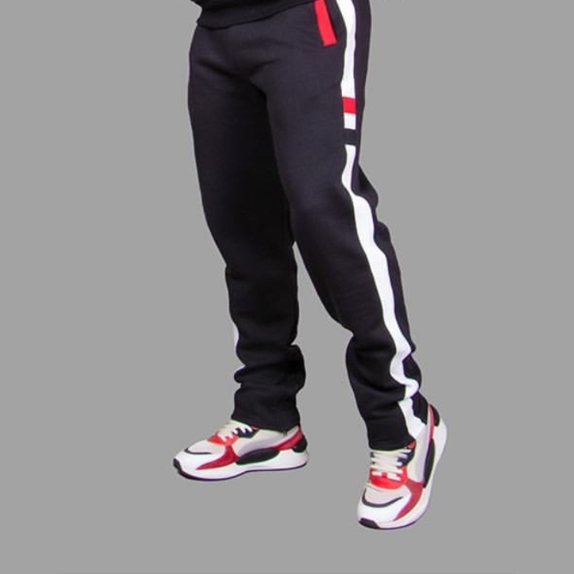 Men's black 320 GSM fleece sweatpants with white side stripe and red accents, worn as a set with the matching stripe sweatshirt — Exetwear, made to order in Nairobi