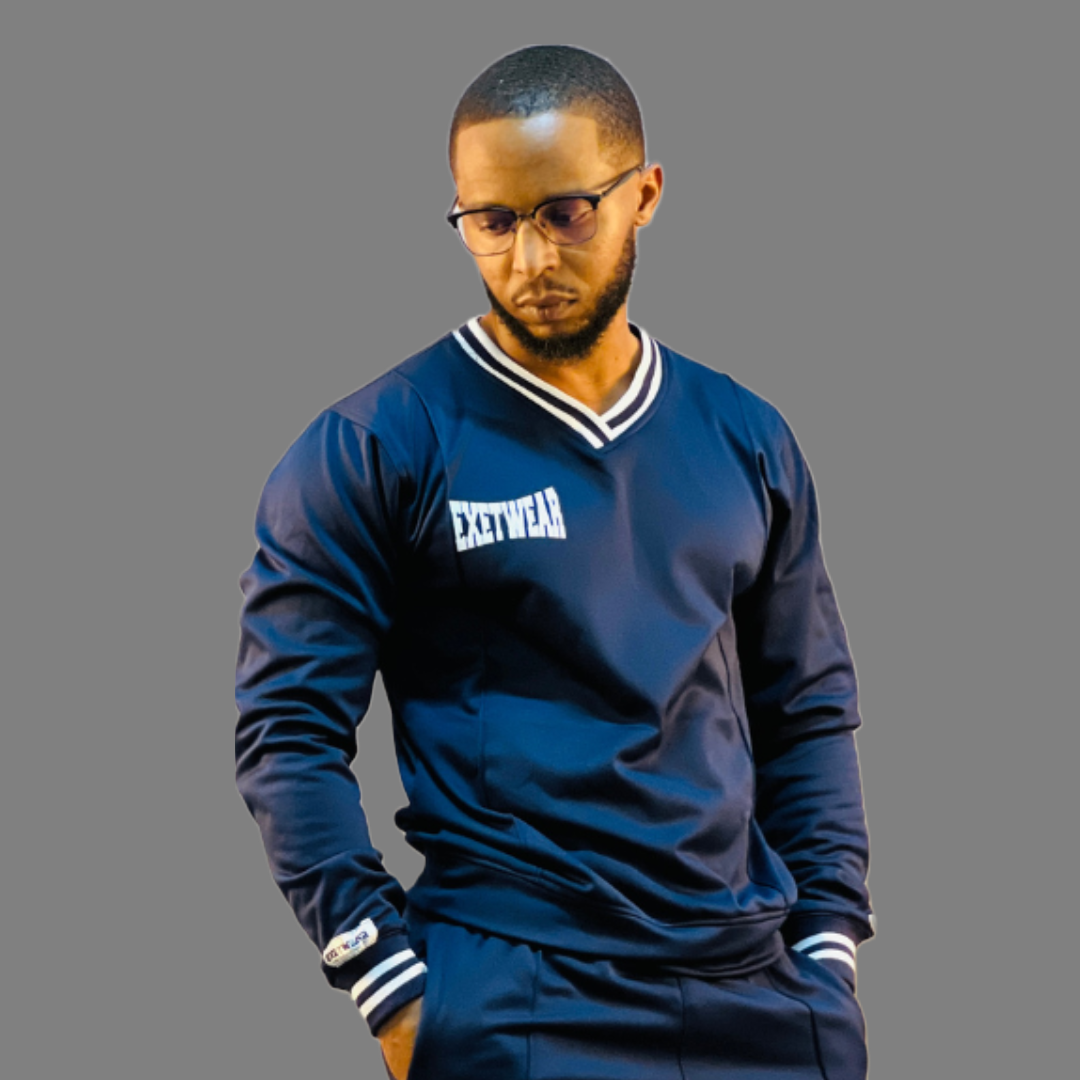 A front view of a navy blue men's tech fleece sweatshirt. The sweatshirt has a sleek design with a logo prominently displayed on the chest