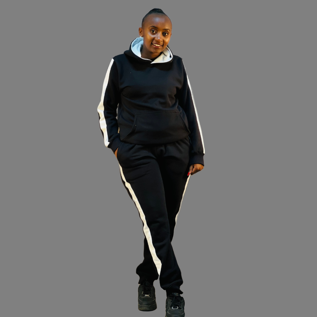 Modern black women's hoodie set featuring ribbed texture and white sleeve stripes.